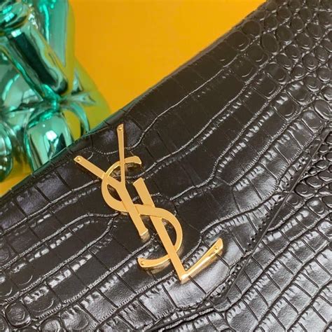 ysl shiny bag|UPTOWN POUCH IN CROCODILE.